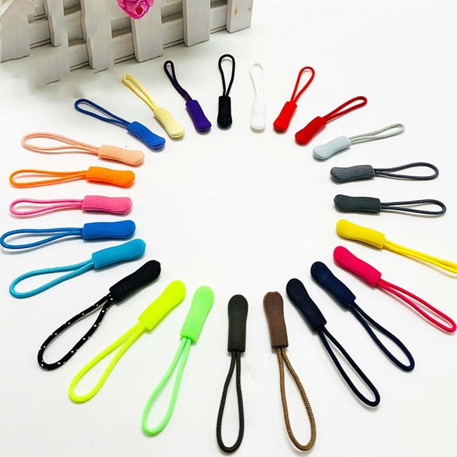 100 Stück QIMONTON Reißverschluss-Schieber aus PVC in Schwarz, Weiß und Mehrfarbig mit Raupen-Design - Bild 1