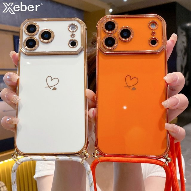 Xeber Umhängetasche mit weicher Silikonhülle und Liebesherz Design für iPhone 17 Pro Max, 16, 15, 14 Plus, 13 in Rot - Bild 1