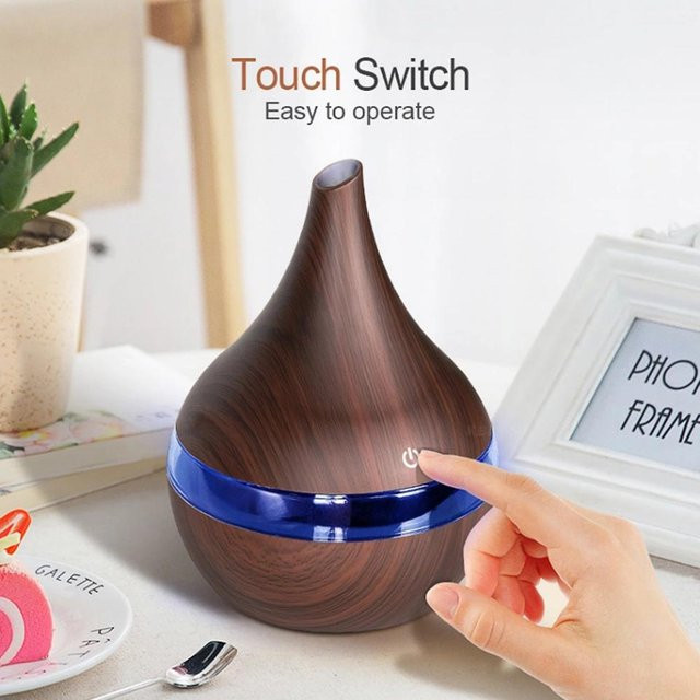 Elektrischer Aroma Luftbefeuchter von KONNWEI mit 300ml Volumen, USB-Betrieb, Kaltnebelgenerator für Aromatherapie in Hellbraun mit Holzoptik - Bild 1