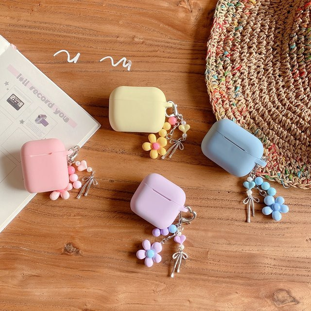 Macaron Silikonhülle mit Blumenanhänger für Apple AirPods 1, 2, 3, 4 und Pro 2, Stoßfest, Farbe: Lila - Bild 1