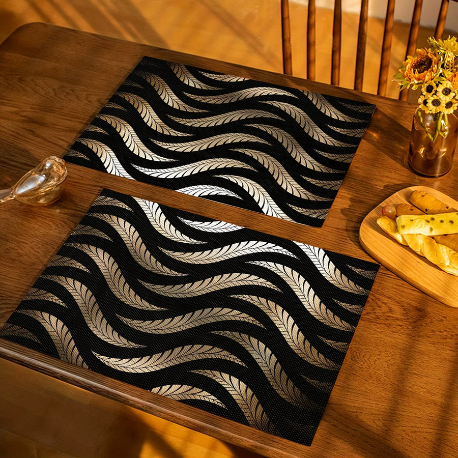 VIKAMA 4-teiliges Set luxuriöse Tischsets aus Leinen mit schwarzem und goldenem Feder-Design in Rechteckform - Bild 3