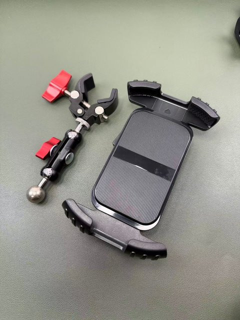 Multifunktionaler Metall-Clip Telefon- und Tablet-Halter in Schwarz mit 360 Grad Drehung und Tischhalterung - Bild 1