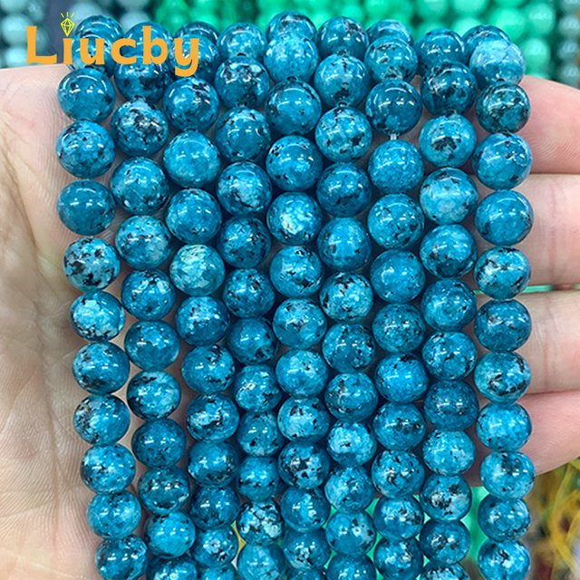 Charm Armband, Lake Blue Spotted Naturstein, Perlen, 8 mm, 15" - Bild 1