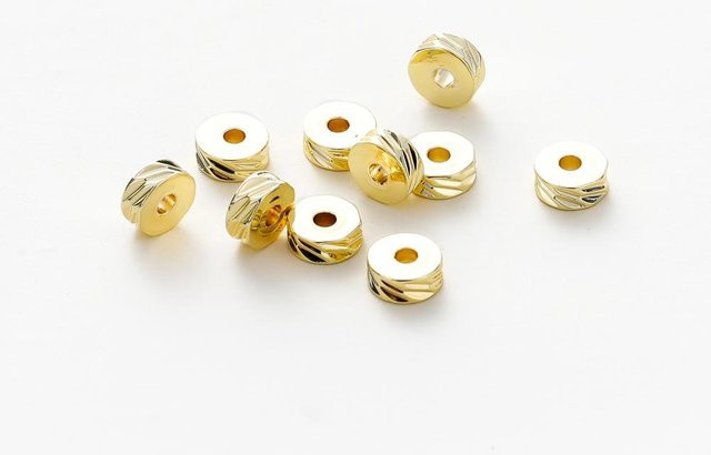 Abstandshalter Perlen, Messingbeschichtet, Gold, 4mm, Unisex - Bild 1