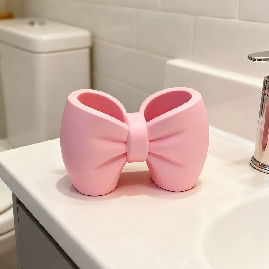 Multifunktionaler Schreibtischhalter mit Schleifenakzent in Pink als Organizer für Stifte und Zahnbürsten - Bild 2