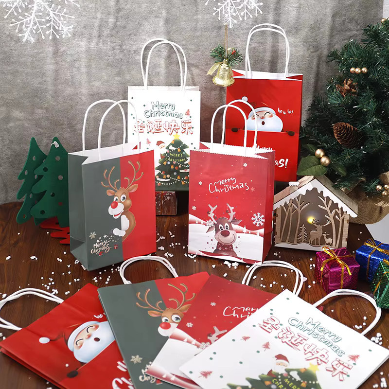 4er Set Weihnachtliche Geschenktüten mit Elch und Santa Claus Muster aus Papier für Süßigkeiten und Kekse - Bild 2