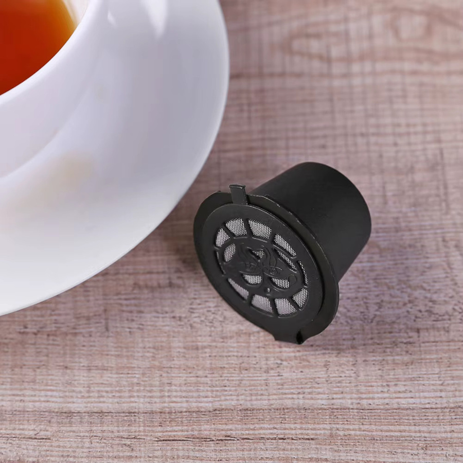 Nachfüllbare Kaffeekapseln für Nespresso Maschinen aus Kunststoff in Schwarz mit Löffel und Pinsel - Bild 4