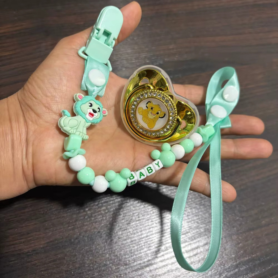 Disney Schnuller-Set mit Schnullerkette und Clip in Grün, BPA-frei aus Silikon - Bild 1