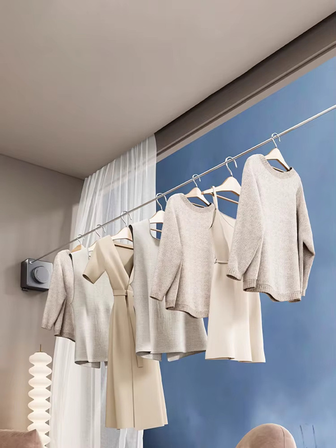 Ausziehbare und zusammenklappbare Wand-Wäscheleine aus Edelstahl in Silber und Weiß für den Innenbereich - Bild 2
