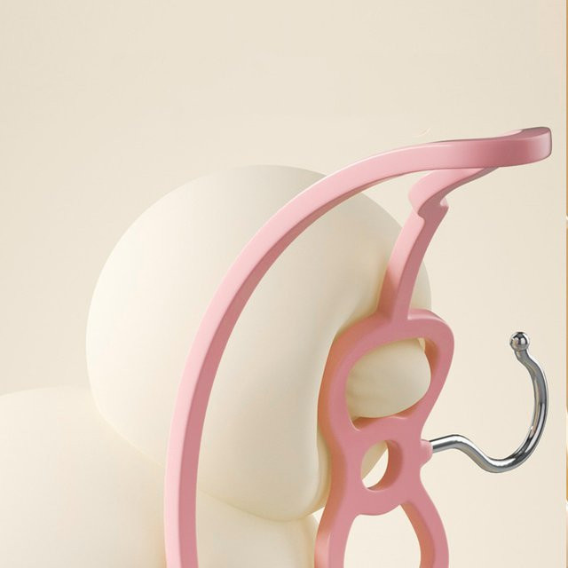Kleiderständer aus Kunststoff mit Herz-Design in Rosa und Schwarz - Bild 1