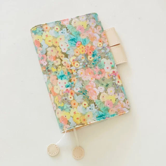 Gebundenes Journal Notebook mit Blumenmuster und Stoffeinband, A5, Kariert, Mehrfarbig - Bild 1