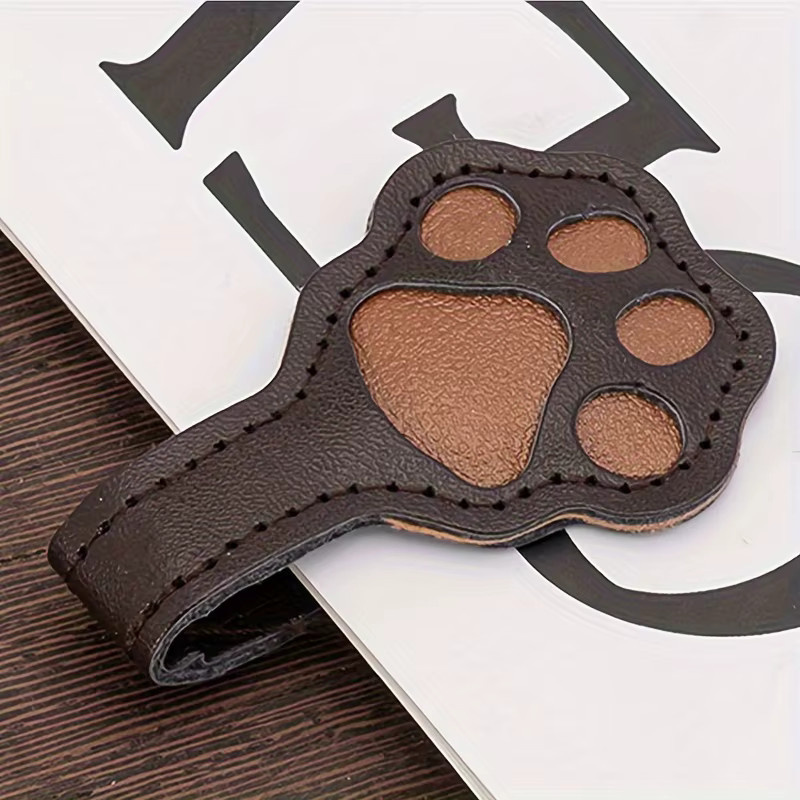 Magnetisches Hundepfoten-Lesezeichen aus PU-Leder in Weiß, Braun und Beige mit geprägtem Design - Bild 1