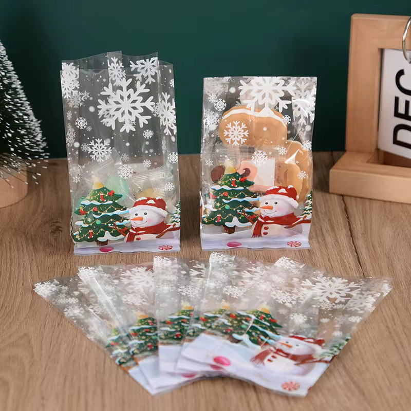 CHIXINHAPPY Transparente Weihnachts-Süßigkeitentüten mit Schneemann und Schneeflocken Motiv für deine Weihnachtsfeier - Bild 2