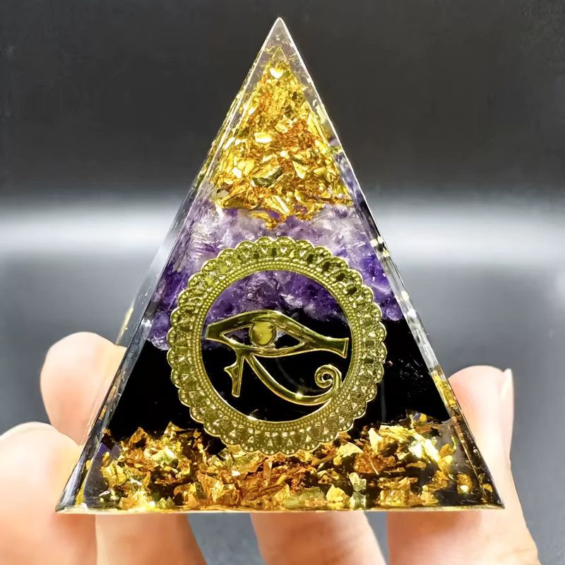 Dekorative Obsidian Kristallpyramide mit ägyptischem Augen-Motiv als Tischdekoration und Worry Stone - Bild 2