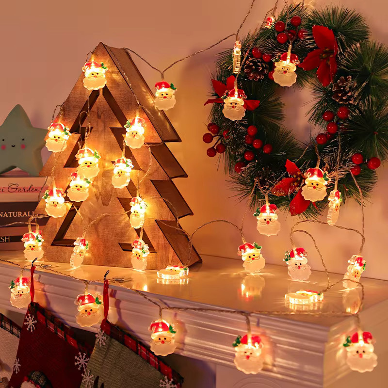 Batteriebetriebene LED Lichterkette mit bunten Weihnachtsfiguren wie Weihnachtsmann, Schneemann und Elch für deine Weihnachtsdekoration und Partys - Bild 2