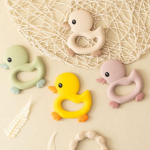Muslin life Baby Beißring Ente aus Silikon, BPA-frei, Gelb/Mehrfarbig - Bild 1