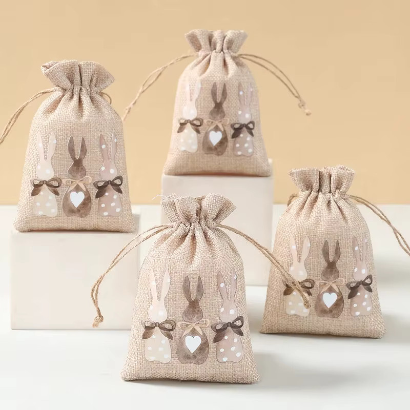VIKAMA 6-teiliges Set Oster-Geschenktüten aus Jute in Beige, wiederverwendbare Kordelzugbeutel für Geschenkverpackung und Snacks, B/H/T: 15 x 15 x 10 cm - Bild 1