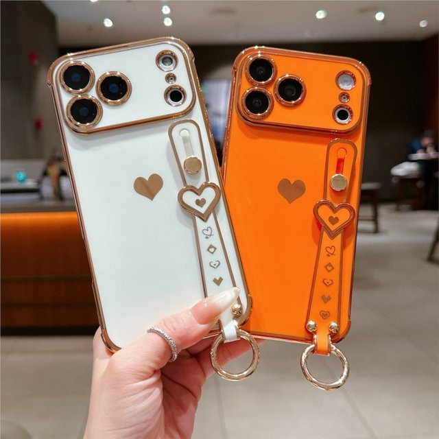 Herzförmige Handgelenkriemen-Hülle für iPhone 11 bis iPhone 17 Pro Max in Rot und Multicolour – Premium Fashion Case - Bild 1