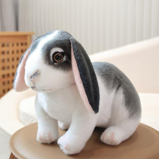Niedliche und realistische Hasenpuppe, Plüschtier, liegend - Bild 1