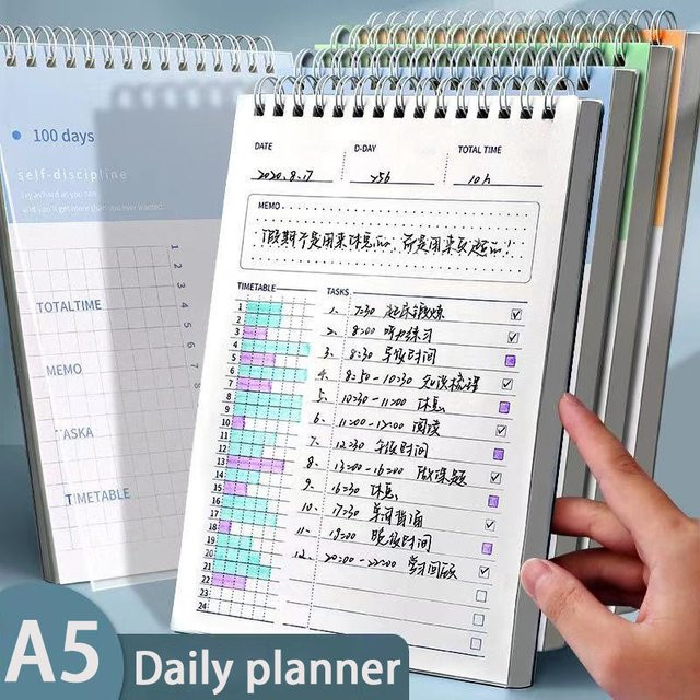 A5 Spiralnotizbuch Daily Planner in Orange mit Softcover für die Zielsetzung und Zeitplanung - Bild 1