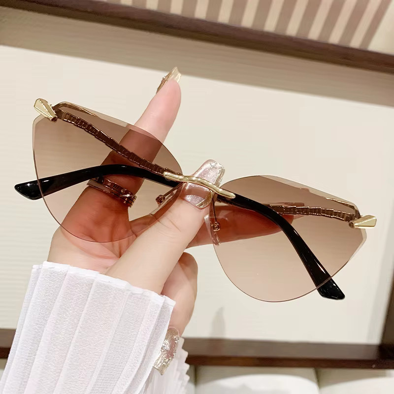 Cat-Eye-Sonnenbrille, randlos, Metall, Damen - Bild 2