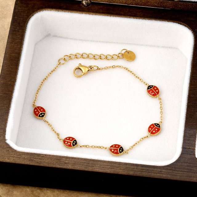 LUXUKISSKIDS Armband, Edelstahl, Rote Käfer, Gold - Bild 1