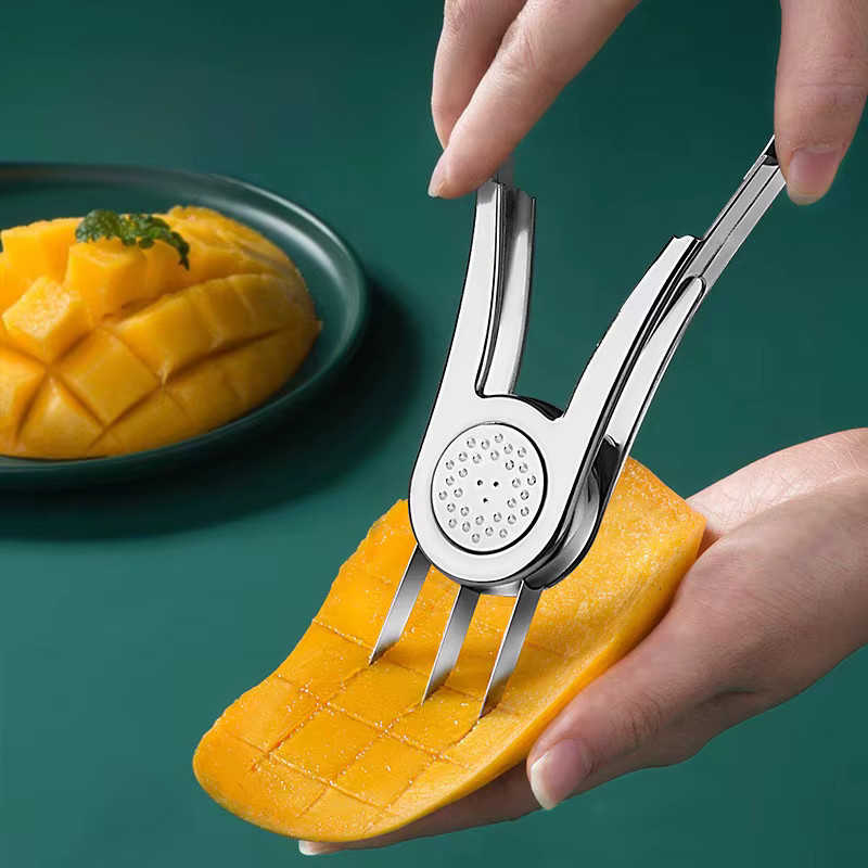 Mango Schäler und Slicer aus Edelstahl in Silber zum Schälen, Entkernen und Würfeln von Obst - Bild 2