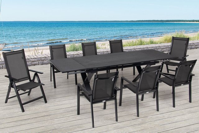 OUTFLEXX Garten-Essgruppe in Anthrazit mit ausziehbarem Tisch aus Aluminium und Keramik sowie 2 Klappstühlen und 6 Stapelsesseln aus Textil - Bild 1