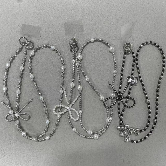 Pearl Love Bow Umhängetasche Ersatzkette in Weiß als vielseitiges Hängezubehör für Schmuck und Telefon - Bild 1