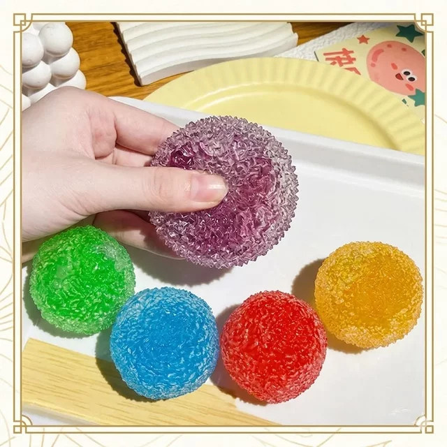 Schylling Squishy Ice Noisy Ball Maltose Fidgets Toy Blindbox, Silikon, Bunt / Mehrfarbig - Bild 1