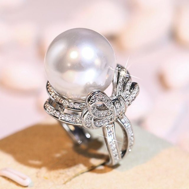 Huitan Fingerring mit Schleife, Perle, Zirkonia, Kupfer, Damen, Schwarz - Bild 1