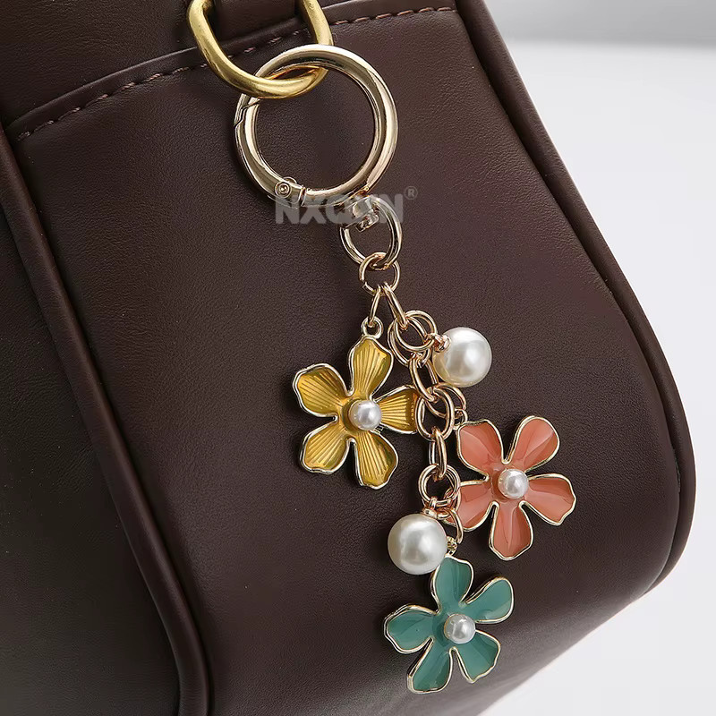 Schlüsselring NXQXN, Perle Blume Emaille, Unisex - Bild 2