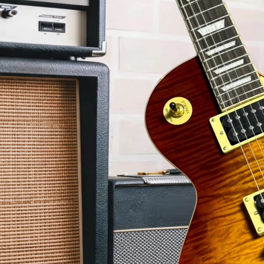 OUCEY Gary Moore Signature LPQ E-Gitarre mit Tiger Flame Maple Decke in Iced Tea Burst und Goldfarbener Hardware - Bild 2