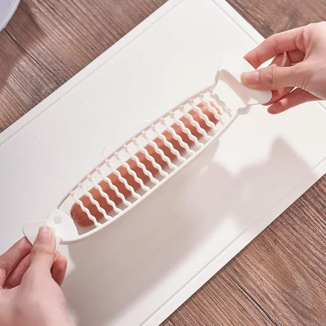 Multifunktionaler Fisch-Slicer aus Kunststoff in Weiß für Wurst, Bananen und Pommes Frites - Bild 1