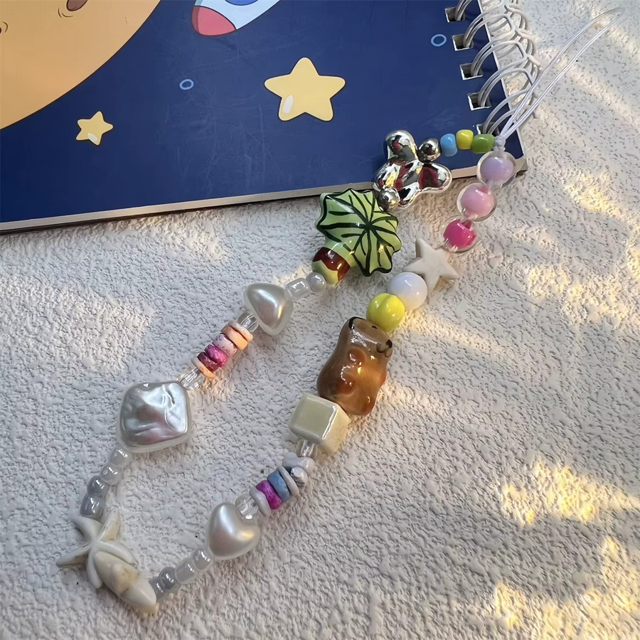 Xyun Handyhülle mit Kokosnussbaum und Seestern Motiv sowie DIY Perlenband Anti-Verlust-Hängeseil in Multicolour - Bild 2