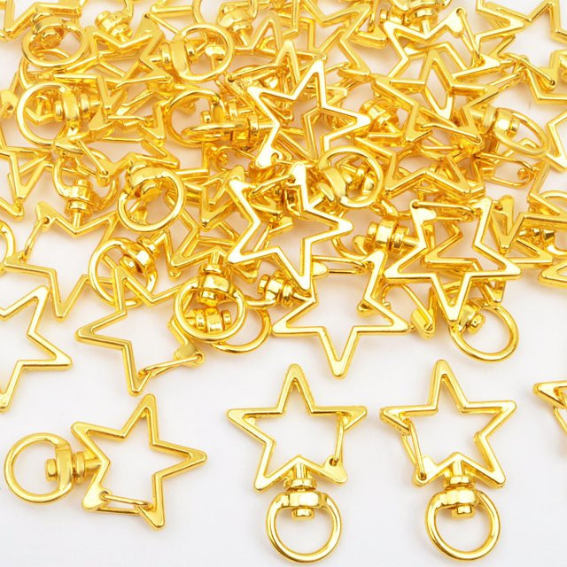 Schlüsselanhänger sternförmig, Messing, Gold, Unisex - Bild 1