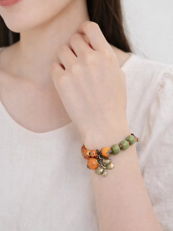 Armband mit Schmetterlings-Anhänger, Keramik, Orange-Grün, Unisex - Bild 2