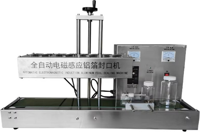 Automatische kontinuierliche Band-Heißsiegelmaschine für Lebensmittel aus Edelstahl in Silber zur Versiegelung von Aluminiumfolie, Kunststoff und Papiertüten - Bild 1