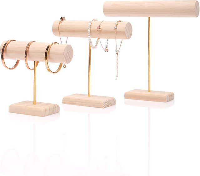Minimalistischer Armbandständer aus Massivholz für Uhren und Armbänder in Beige und Gelb - Bild 1