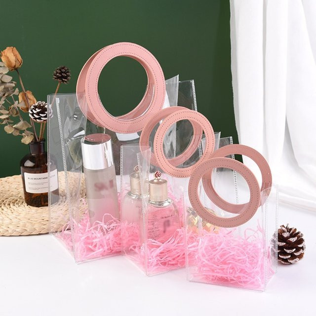 Transparente PVC-Einkaufstasche mit großer Kapazität und wasserdichter Aufbewahrungsmöglichkeit in Transparent - Bild 1