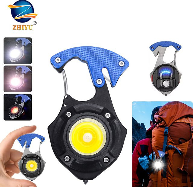 ZHIYU Mini-COB-Schlüsselanhänger-Taschenlampe mit 7 Beleuchtungsmodi, wiederaufladbare LED-Notfalllampe mit Schraubendreher, Fensterbrechhammer und Sicherheitsgurtschneider - Bild 1
