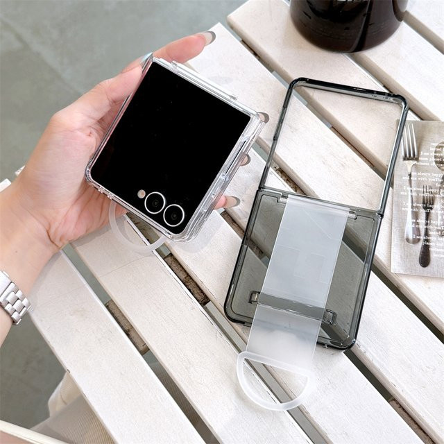Transparente Handyhülle mit elastischem Handschlaufe für Samsung Galaxy Z Flip7, Z Flip6, Z Flip 5 und Z Flip7 FE mit schützender harter Rückseite - Bild 1