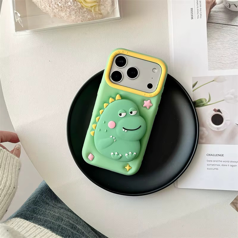 MUQGEW Silikon Schutzhülle mit 3D Cartoon Dinosaurier Teleskop Halterung für iPhone 17 16e 15 14 13 Pro Max in Grün - Bild 2
