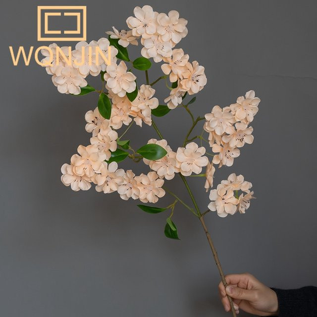 WQNJIN Künstliche Kirschblüten Dekoration in Pink für Wohnzimmer und Esstisch - Bild 1