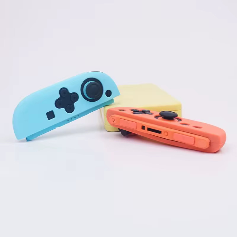 Nintendo Silikonhüllen-Set für Switch 2 mit Joy-Con Controller Schutzhüllen und Daumengriffen in Blau und Orange - Bild 5