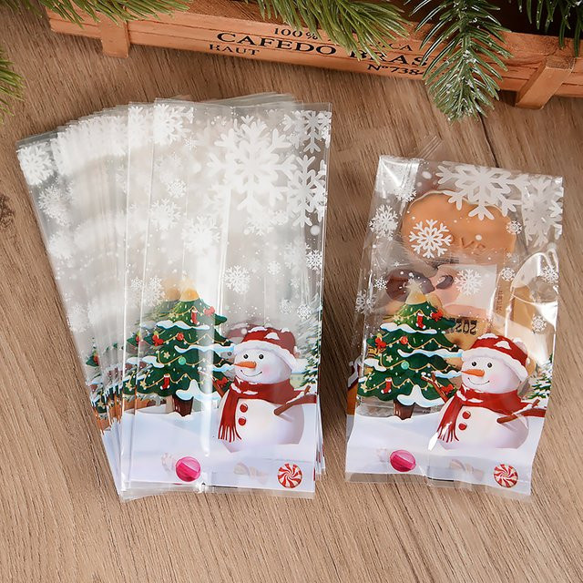 CHIXINHAPPY Transparente Weihnachts-Süßigkeitentüten mit Schneemann und Schneeflocken Motiv für deine Weihnachtsfeier - Bild 1
