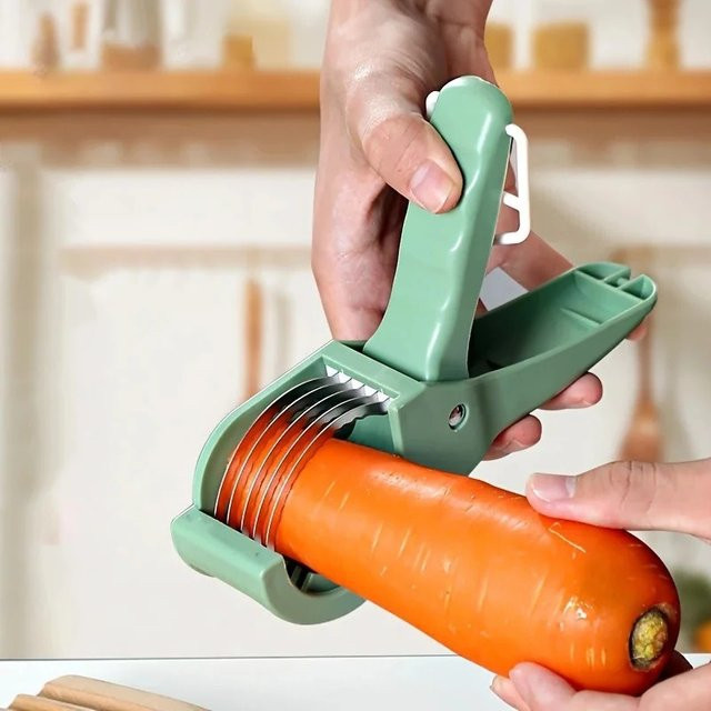 Multifunktionaler Gemüseslicer aus Edelstahl von PDQ in Grün für Obst, Gemüse und Kartoffeln - Bild 1