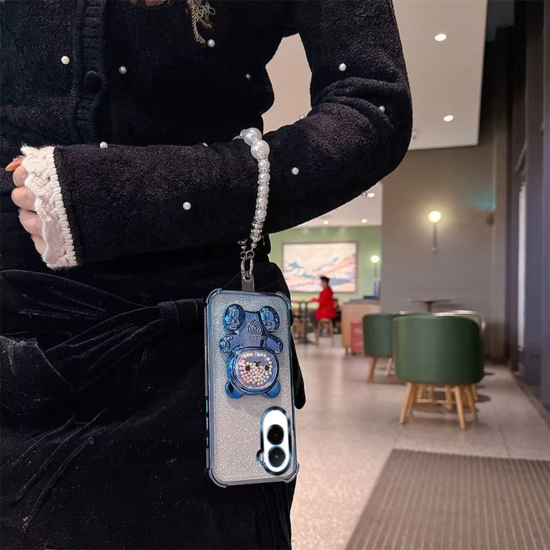 Stoßfeste Handyhülle mit Bären-Cartoon-Design, Glitzer-Effekt und Perlen-Lanyard für Xiaomi Poco M7 Plus, F7 und X7 Pro in Pink - Bild 3