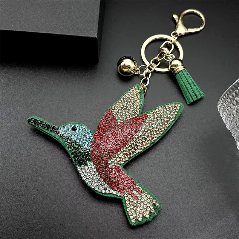 AFAWA Schlüsselanhänger, Fliegender Kolibri, bunter Strass, rote Quaste, Unisex - Bild 1