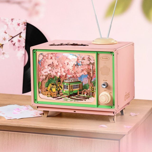 Robotime DIY Musikbox Sakura Dreamy Tour 3D Holzpuzzle Buchnische TV-Modellbausatz in Pink - Bild 1